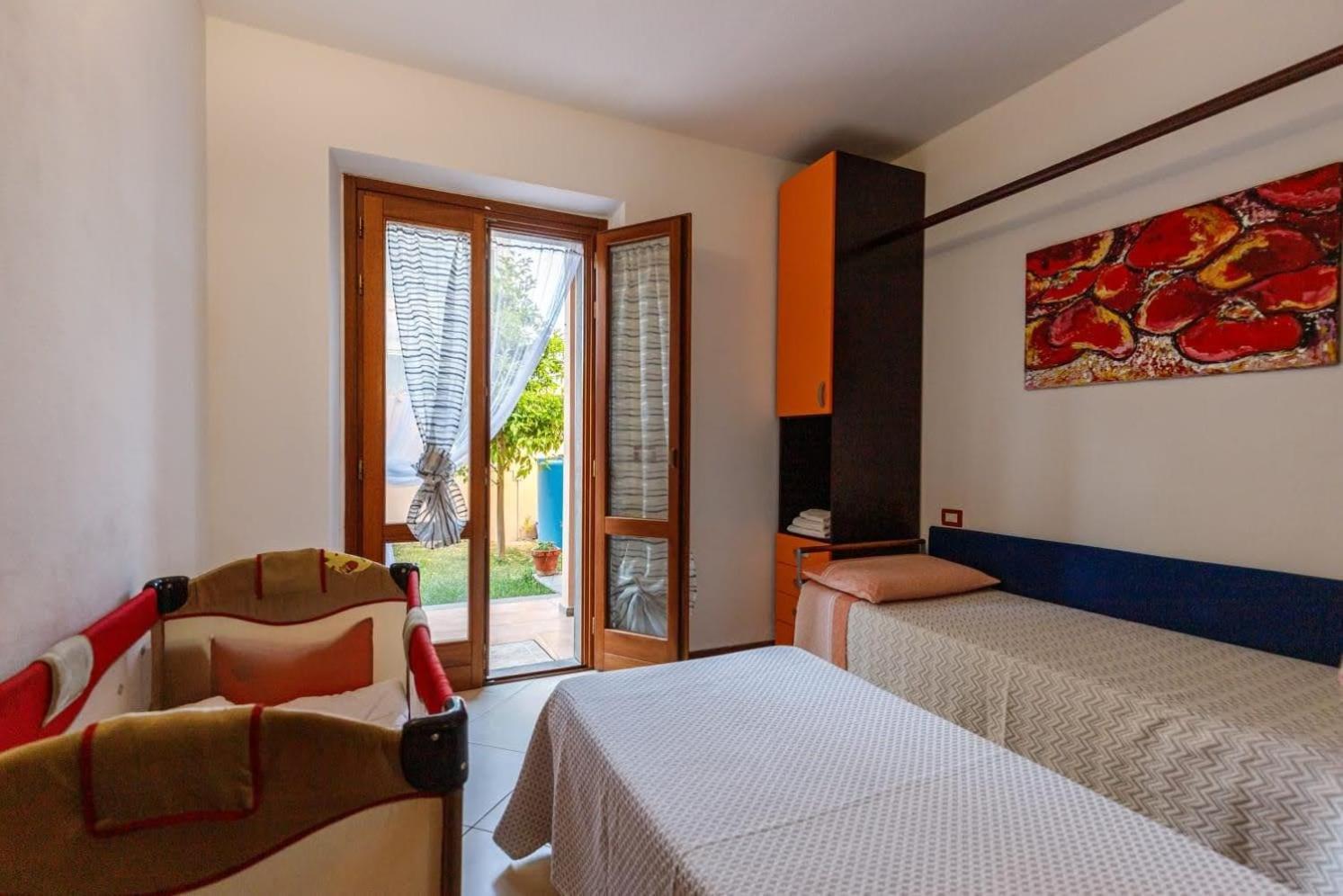 Апартаменты Casa Lilla 1 E 2 Ористано Номер фото